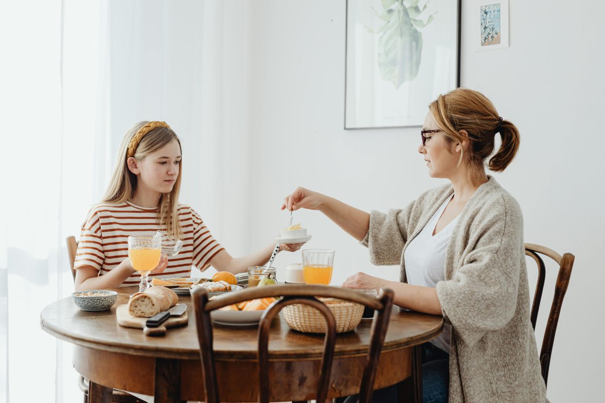 Mum and daughter sharing a meal together